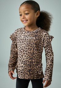 Langärmliges Leopardenmuster-Hemd mit Rüschenschultern, im Rippstrick-Muster, in neutralen Brauntönen und Beigetönen, mit Rundhalsausschnitt.