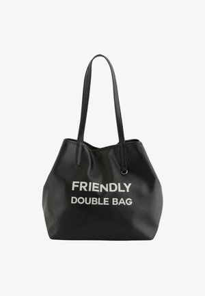 Bolso tote negro con textura, con dos asas largas, que presenta el texto impreso "BOLSO DOBLE AMIGABLE" en letras blancas en negrita en la parte frontal.
