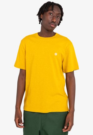Yellow cotton t-shirt with a crew neckline, short sleeves, and a small white logo on the chest. Soft texture, relaxed fit.