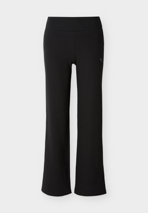 Pantalon large noir avec taille élastique et logo Puma subtil sur la partie supérieure de la cuisse gauche, présenté sur fond blanc.