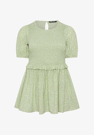 Vestido corto de manga corta verde claro con cuerpo fruncido, detalle de volante en la cintura y pequeño patrón floral blanco.