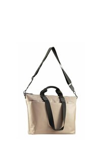 Sac fourre-tout imperméable beige avec double poignée noire et une bandoulière réglable, présentant une texture lisse et une fermeture zippée.