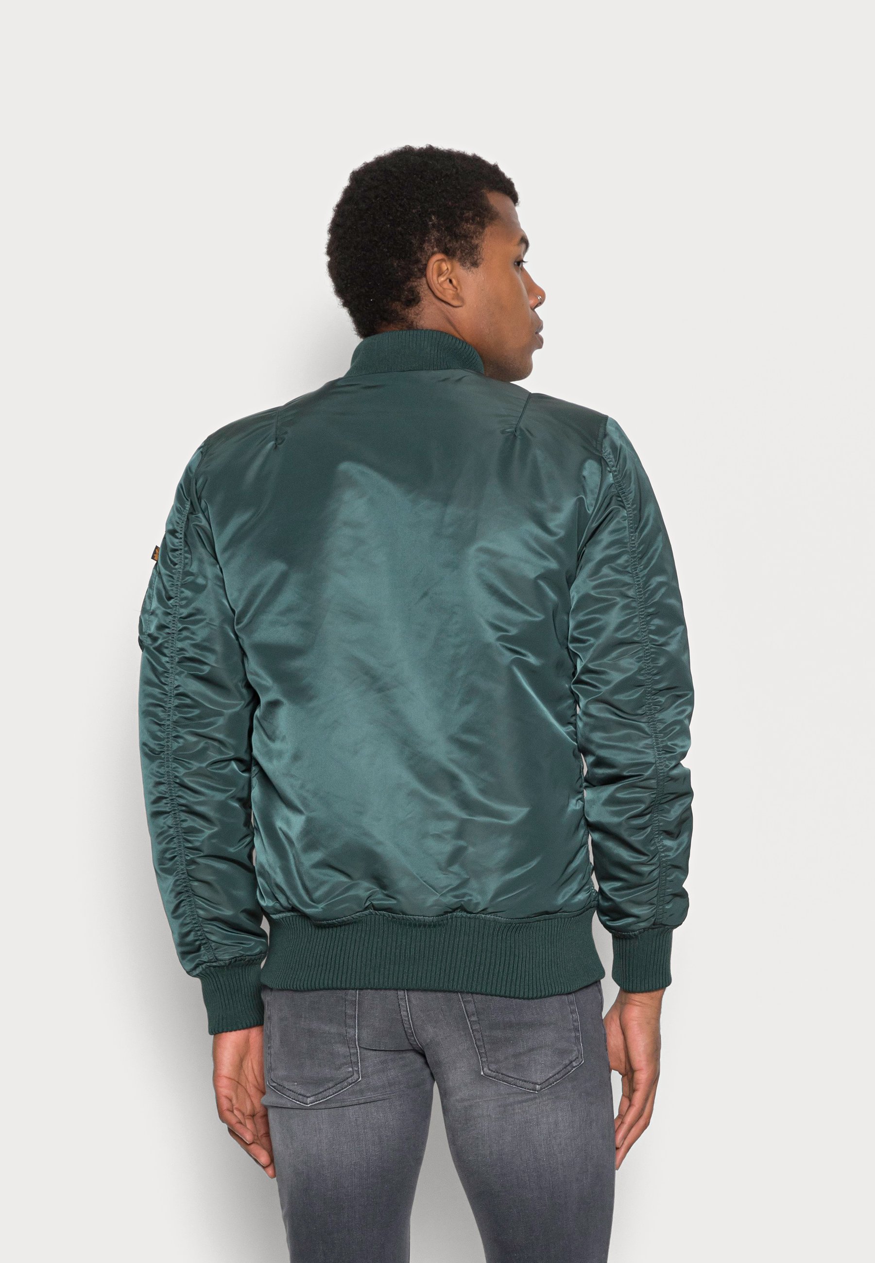 navy green flight jacket