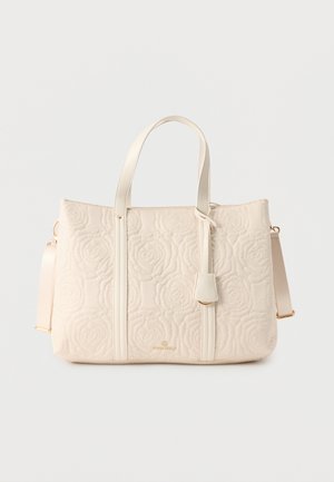 Τσαντάκι tote από κρεμ καπιτονέ ύφασμα με κεντήματα με λουλούδια, διπλές λαβές, αποσπώμενο ιμάντα ώμου και μικρή ετικέτα μπροστά.