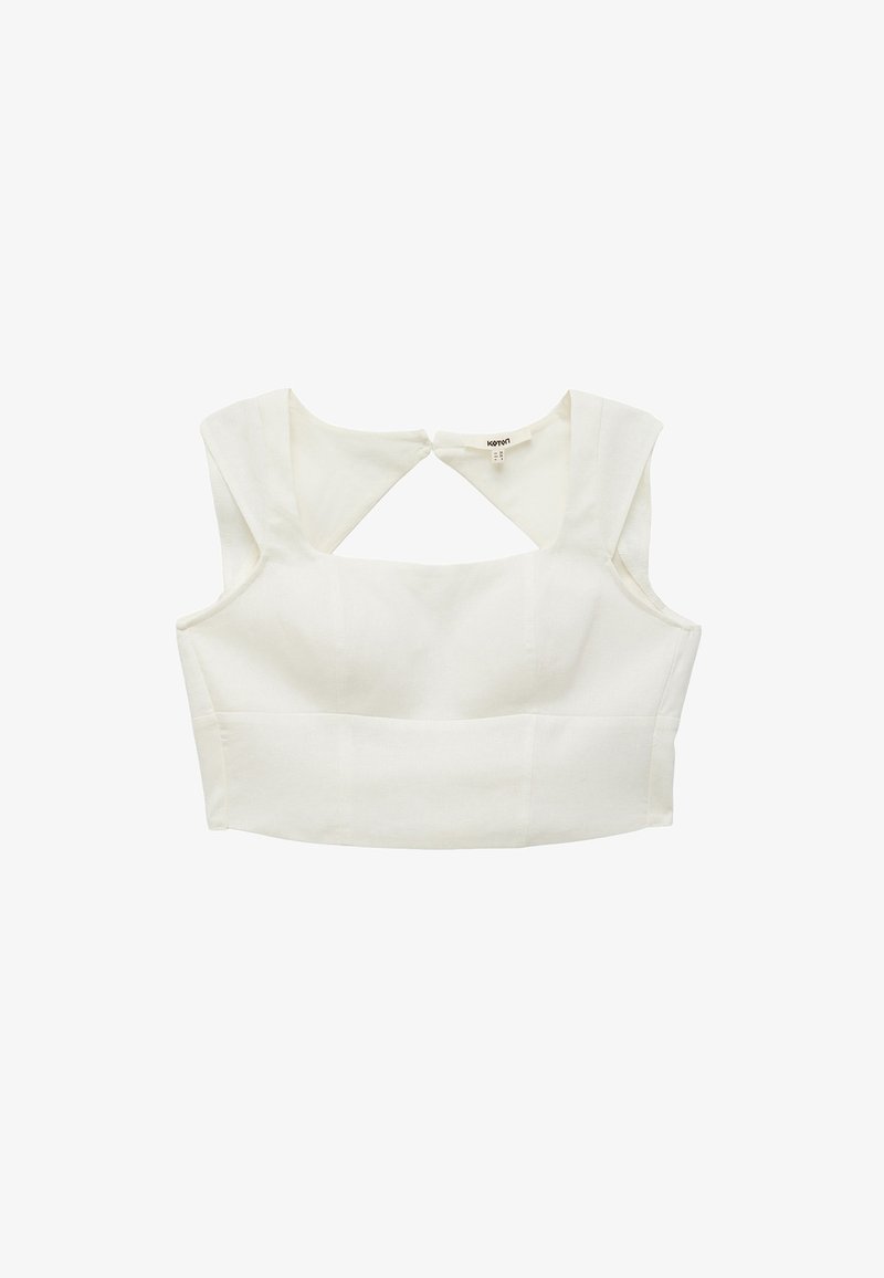 White cropped top with a structured design, featuring wide shoulder straps and a keyhole cutout at the back. Smooth texture, no patterns.