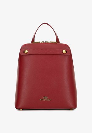 Červená kožená kabelka s horním úchopem, zlatým kováním, zipovým uzávěrem a logem Wittchen uprostřed přední části.