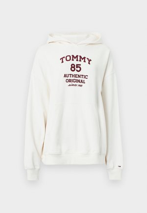 Krém színű pulóver elöl zsebbel, húzózsinóros kapucnival és bordó felirattal, amely így szól: "TOMMY 85 AUTHENTIC ORIGINAL since 1985."