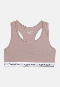 Αθλητικό σουτιέν racerback σε ανοιχτό μωβ χρώμα με λευκή ελαστική ταινία που φέρει το επαναλαμβανόμενο μαύρο λογότυπο Calvin Klein.