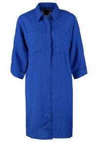 Blue button-up shirt dress in smooth fabric, featuring two chest pockets and rolled-up sleeves. Knee-length with a straight cut.