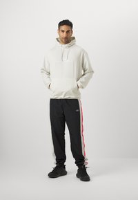 Under Armour UNSTOPPABLE  - Hættetrøje - summit white/white