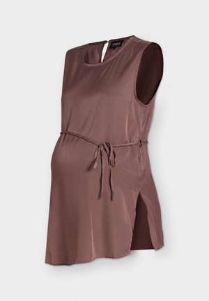 Blusa de maternidad sin mangas en color malva con escote redondo, lazo en la cintura, abertura lateral y cierre con botón ojo de cerradura en la espalda.