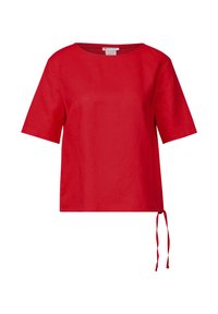 Top in lino rosso con vestibilità ampia, scollo largo e maniche corte. Presenta un dettaglio laterale a fiocco per la regolazione e una texture liscia.