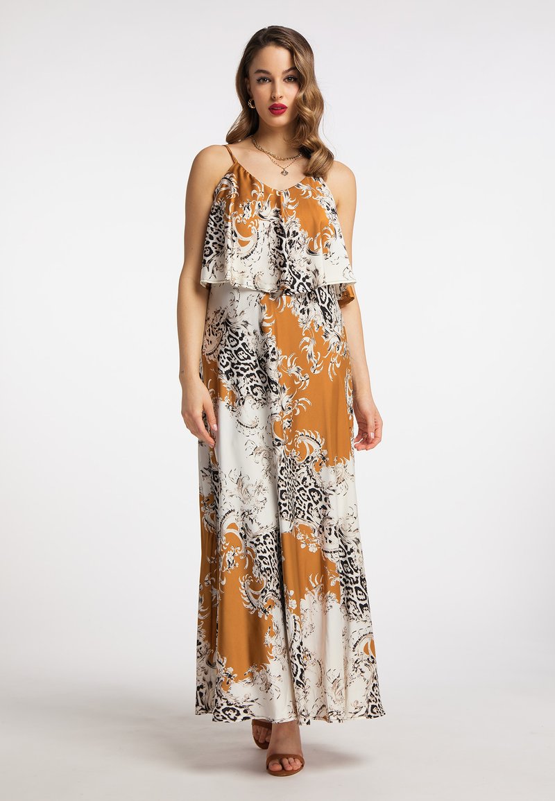 Maxikleid in braun, weiß und schwarz mit floralem Muster, mehrlagigem Rüschensaum, Spaghetti-Trägern und fließendem Design. Glatte Stofftextur.