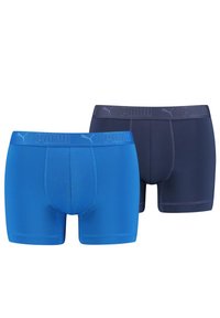 PUMA men’s boxer briefs in blue and navy. Stretch fabric, elastic waistband with logo, double-stitch seams, and smooth texture.