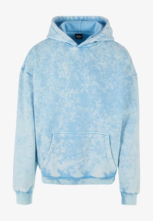 Vaaleansininen huppari, jossa on marmoroitu kuvio, kengurupocket ja ribattu helma ja hihansuut. Valmistettu pehmeästä kankaasta, rento malli.