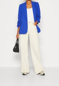 Marks & Spencer Kort kappa / rock - blue