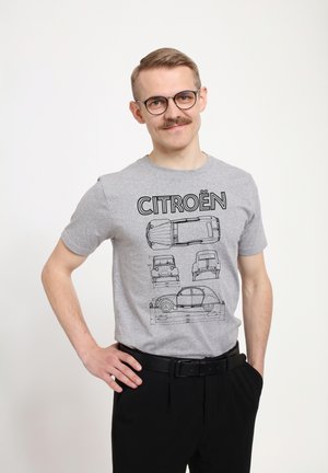 Graues Baumwoll-T-Shirt mit schwarzen Lin Zeichnungen von Citroën-Autos und "CITROËN" in fetter Schrift über den Illustrationen.