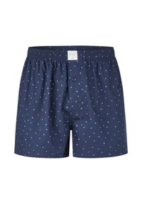 Caleçons pour hommes bleu marine avec un motif à petits pois bleu clair et une ceinture élastique dotée d'une braguette avant à boutons et d'une étiquette de marque.
