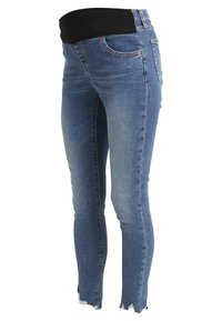 Blå denim skinny jeans med en svart elastisk midja, med en slitna fåll och fem fickor.