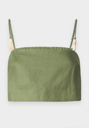 Green linen cropped top with adjustable spaghetti straps, featuring decorative beads on the straps and a gathered elastic neckline.