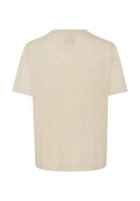 Light beige cotton t-shirt with a relaxed fit, short sleeves, and a rounded neckline. Features a subtle texture and minimal stitching detail.