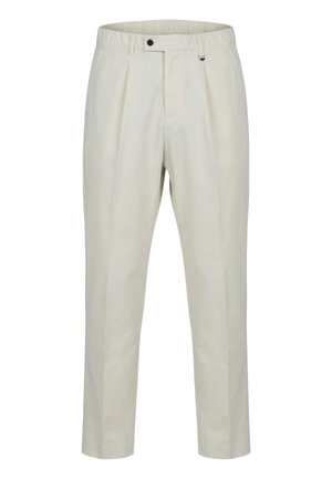 Pantalones beige a medida con pinzas delanteras, cintura elástica, botón negro y presilla con cierre metálico.