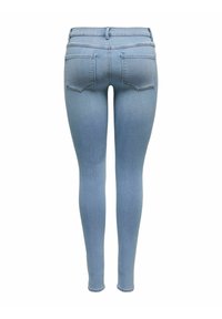 Heledad sinised skinny teksad, mis on valmistatud denimist, keskmise tõusuga vöökoht, kaks tagumist taskut koos tikitud kujundusega ja sile tekstuur.