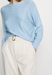 Culture Neule - light blue