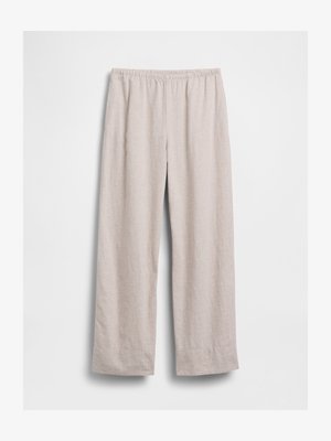 Ανοιχτό μπεζ, φαρδύ παντελόνι με ελαστική μέση, ίσια μπατζάκια και χωρίς ορατές τσέπες, παρουσιάζεται απλωμένο σε λευκό φόντο.