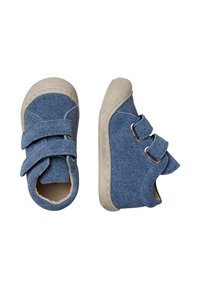 Blue denim shoes with two velcro straps, beige rubber soles, and a rounded toe. Textured fabric with a stitched seam around the edge.