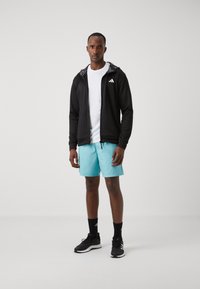 adidas Performance TRAIN ESSENTIALS CAMO FULL ZIP - Chaqueta de entrenamiento - black