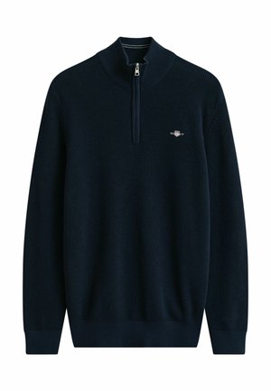 Marineblauer Strickpullover mit langen Ärmeln, Viertelreißverschluss, gerippten Bündchen und Saum sowie kleinem gesticktem Logo auf der Brust.