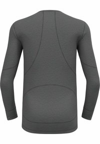 Chemise à manches longues en tissu gris foncé avec une texture lisse. Dotée de manches raglan et de détails de couture dans le dos.