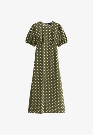 Robe midi vert olive à pois blancs, manches courtes bouffantes, taille froncée et encolure ronde.