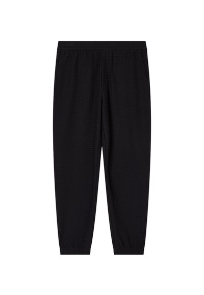 Pantaloni sportivi neri con vita elasticizzata, caviglie affusolate e dettagli di texture discreti. Senza tasche visibili. Design semplice e funzionale.