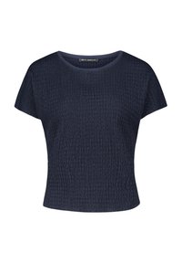 Top corto blu navy con superficie texturizzata e stropicciata, scollatura tonda e vestibilità rilassata. Caratterizzato da un orlo semplice e un design minimale.