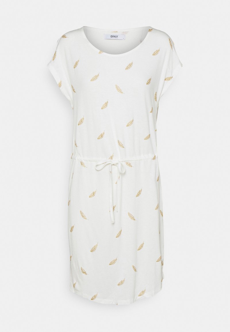 Vit klänning med korta ärmar och rund halsringning, prydd med ett guldigt fjädermönster och dragsko i midjan. Mjuk och lätt textil.