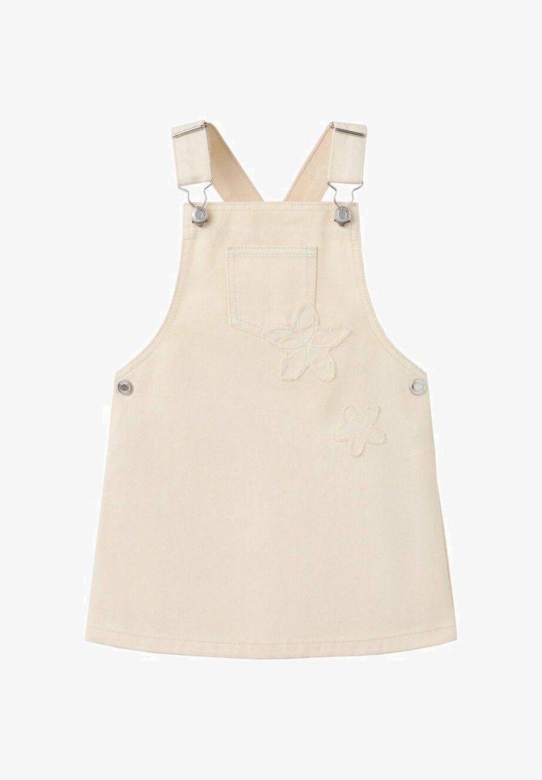 Vestito salopette in denim beige con bretelle regolabili, ferramenta argentata, tasca frontale e dettagli floreali ricamati sul davanti.