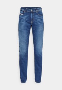 Blå denimjeans med rak benform, som har en knappstängning, framfickor och subtila blekningsdetaljer vid låren.