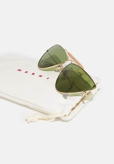 Green-tinted triangular sunglasses with gold metal frame; glasses resting on a white pouch with "MARNI" printed in red.