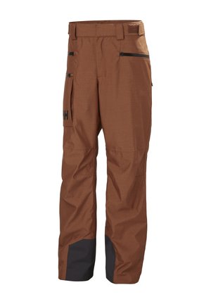 Skihosen aus braunem Stoff mit schwarzen Akzenten, ausgestattet mit zwei seitlichen Reißverschlusstaschen, einem Gürtel und verstärkten Säumen. Wasserabweisendes und strapazierfähiges Design.