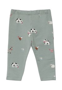 Lichtgroene legging gemaakt van katoen, met een patroon van boerderijdieren zoals koeien, schapen en een kip, voorzien van bloemige accenten en een comfortabele tailleband.