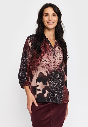 Blus - winet