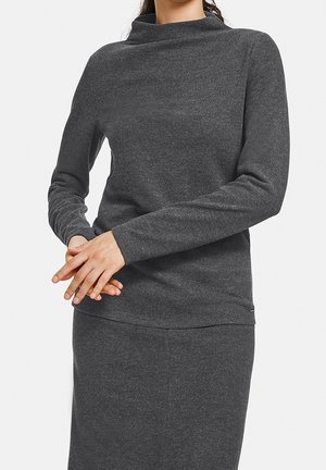 Dunkelgraues Langarmshirt mit hochgeschlossenem Kragen, aus weichem, strukturiertem Stoff gefertigt. Verfügt über enganliegende Ärmel und einen abgerundeten Saum.