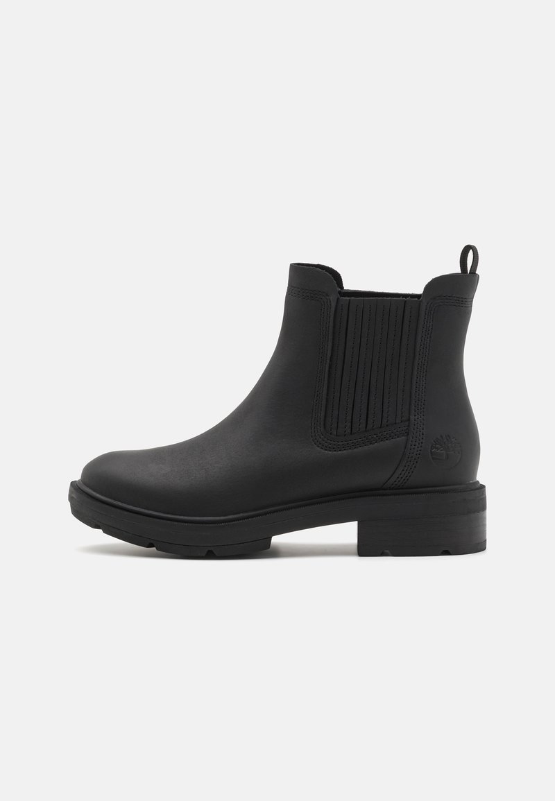 Bottine en cuir noir avec panneau latéral élastique, languette au talon, talon bas superposé et bout rond.