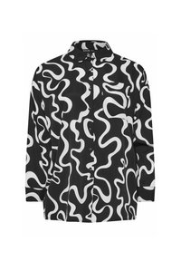Camicia a maniche lunghe bianca e nera, con un motivo astratto a spirale, caratterizzata da un colletto e una tasca sul petto.