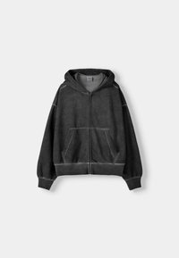 Sudadera con cremallera en mezcla de algodón gris oscuro. Cuenta con capucha, bolsillos delanteros, puños y dobladillo acanalados, con detalles de costuras en contraste.