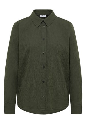 Chemise vert olive à manches longues, boutonnée, en tissu texturé avec col pointu, comportant six boutons sur le devant.