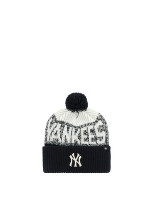 Knit black and white winter hat with pom-pom, "YANKEES" text, and New York Yankees logo on the cuff.