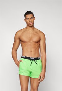 Puma - SWIM MEN LOGO LENGTH - Surfshorts - green Miniatyrbild 1